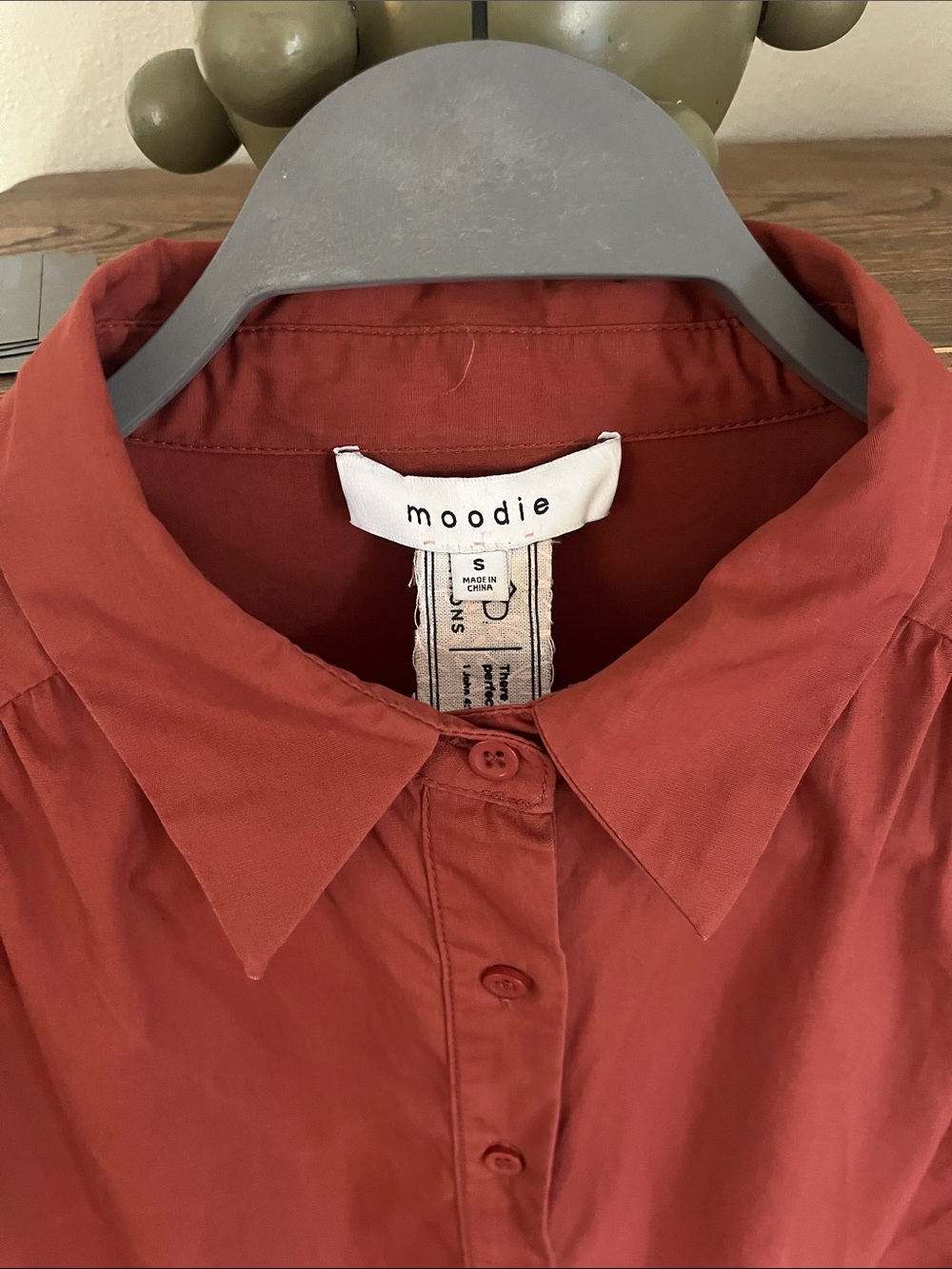 Moodie Rust Button-Front Ruffle Hem Short Sleeve Top - Picture 2 of 7